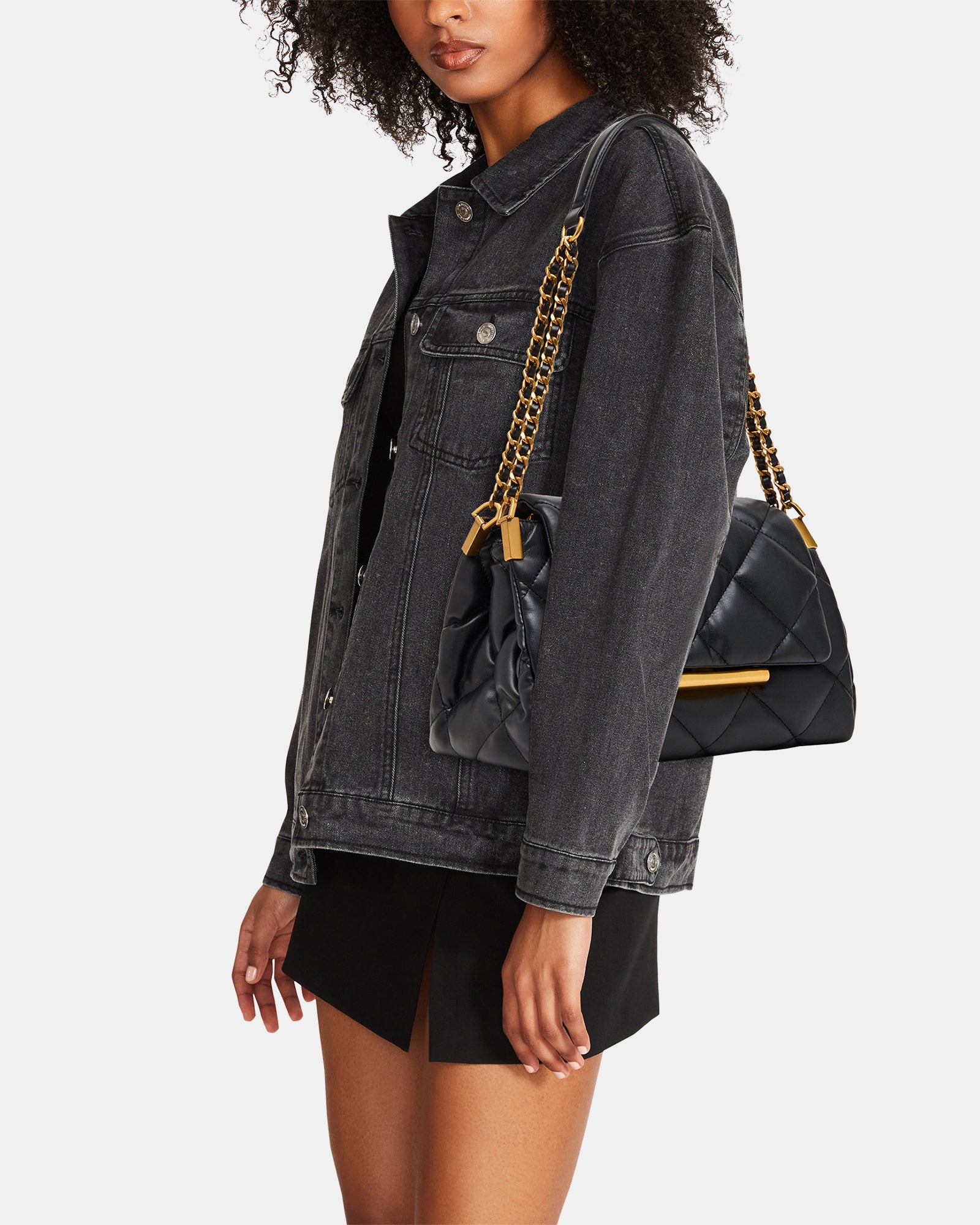 STEVEMADDEN_HANDBAGS_BCOLETTE_BLACK-GOLD_02_MODEL.jpg