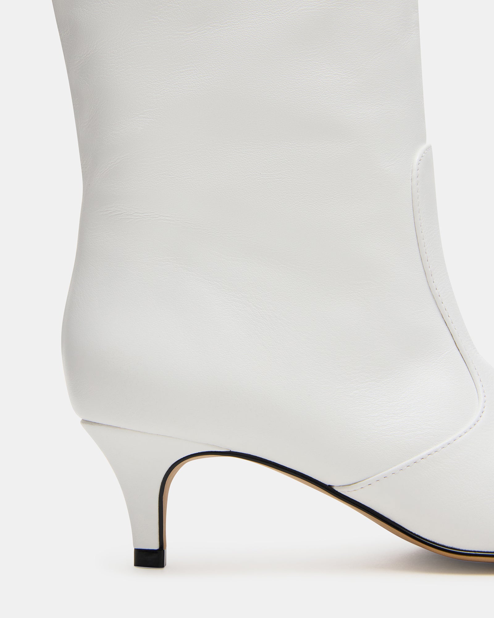 STEVEMADDEN_SHOES_LANDER_WHITE-LEATHER_04_7b9f4174-89a4-4d85-ab6a-c6597d0e46e9.jpg