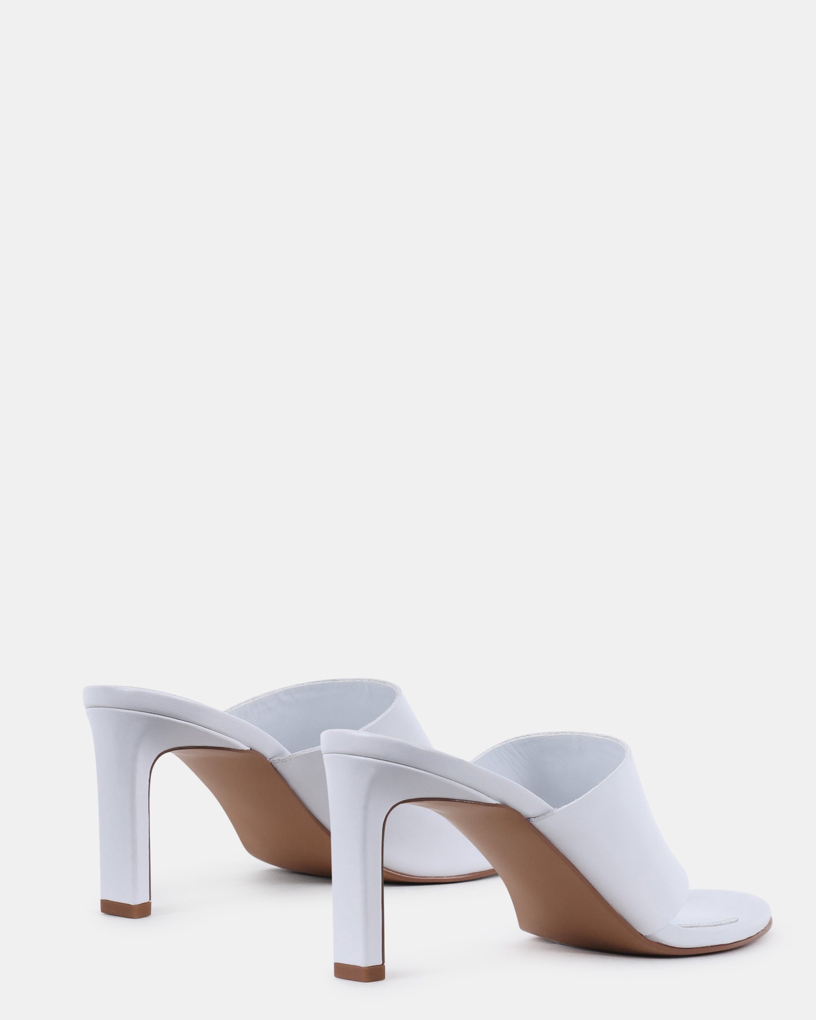 STEVE_MADDEN_SHOES_VALENTIN_WHITE_ANGLE1_PAIR_56631667-687e-401b-9d32-3c21bf077a4f.jpg